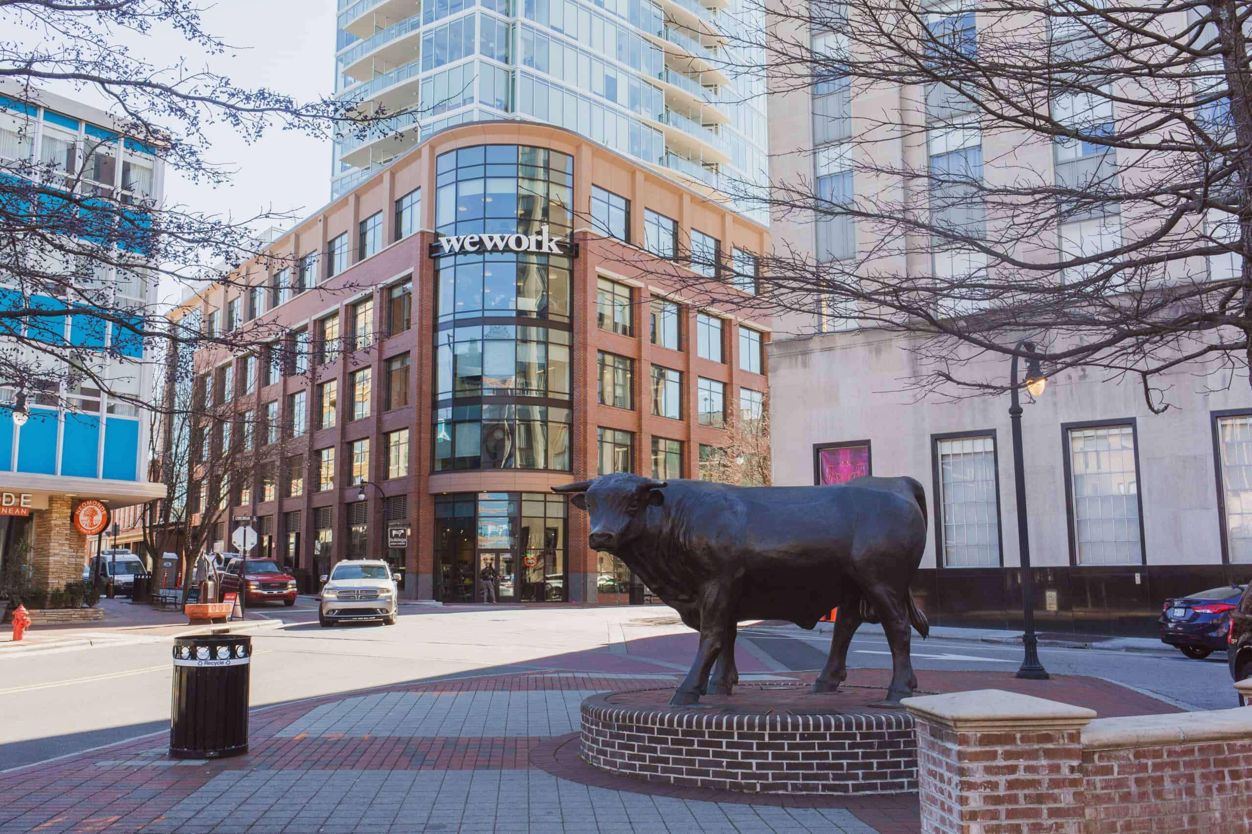 colin-rowley-downtown durham CCB Plaza with Bull looking at We Work Building and 21 c Hotel-unsplash (1)