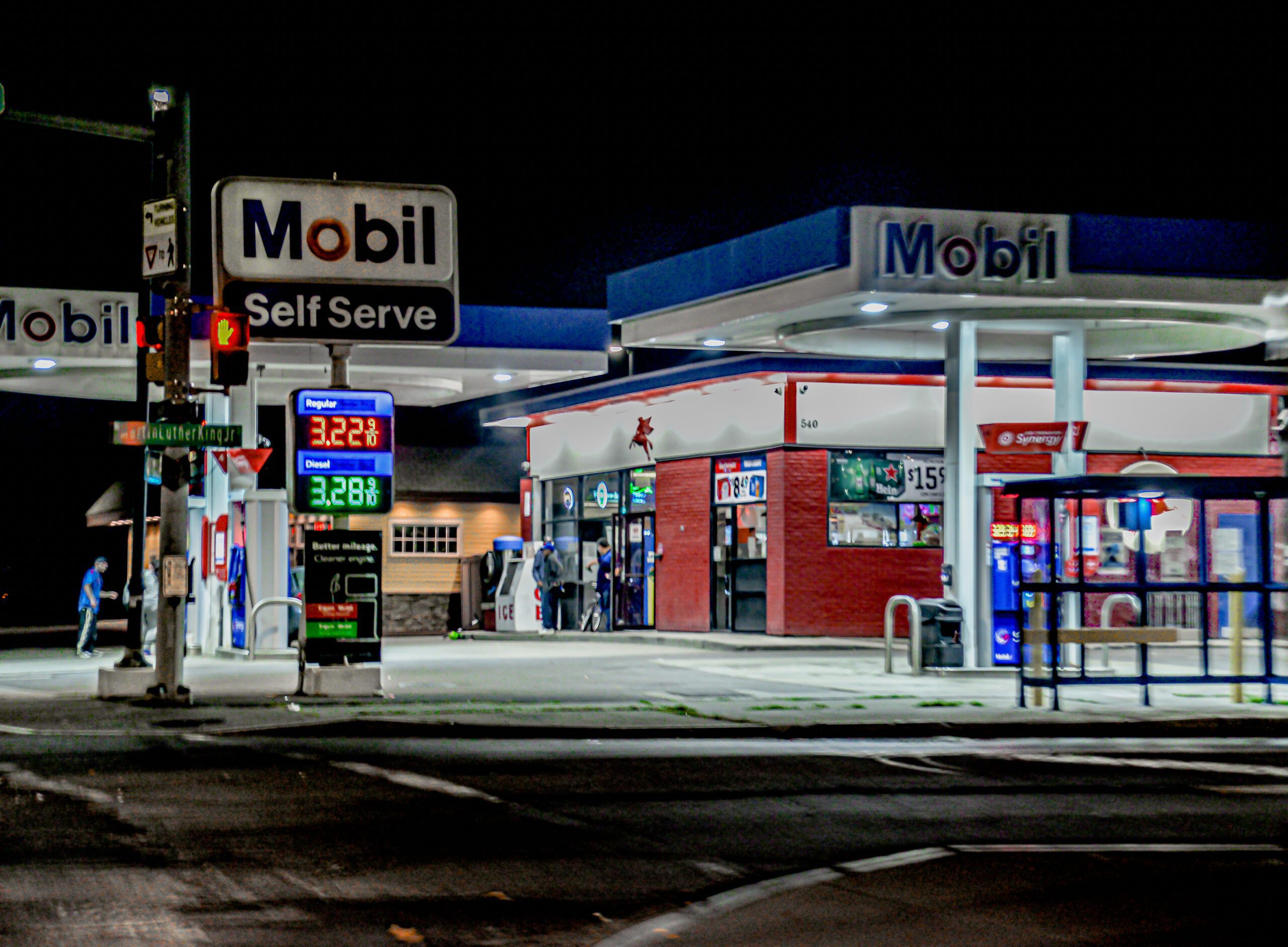 Mobil Gas station at night on MLKjr street Ithaca NY by Franklin Crawford