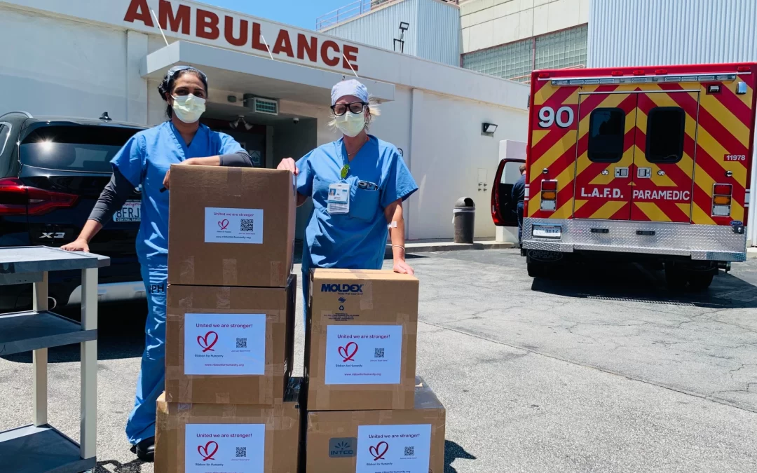 alex-mecl-Two Nurses receiving Covid medical Supplies -unsplash-scaled