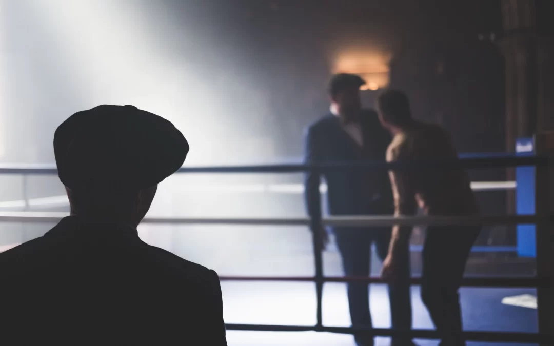 dan-burton-A scene in a boxing ring two men film noir Dan Burton image from Unsplash