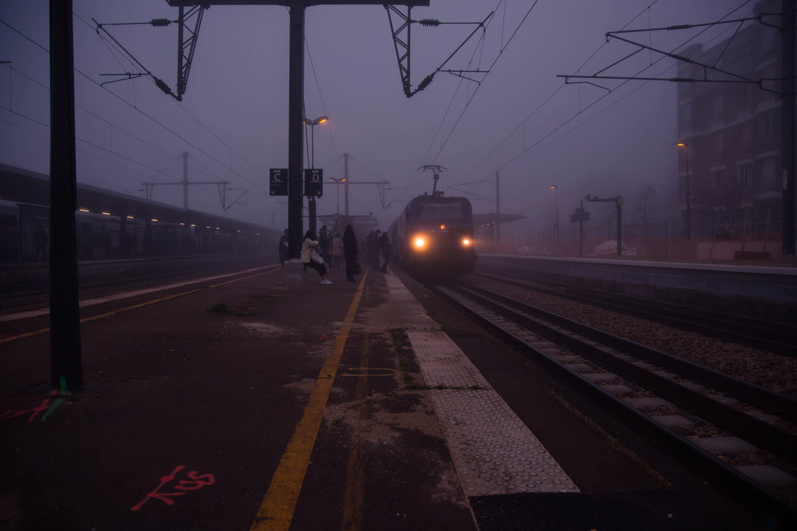 gilles-rolland-monnet-e_i-AfRKEHs-Night Train station at dusk-unsplash
