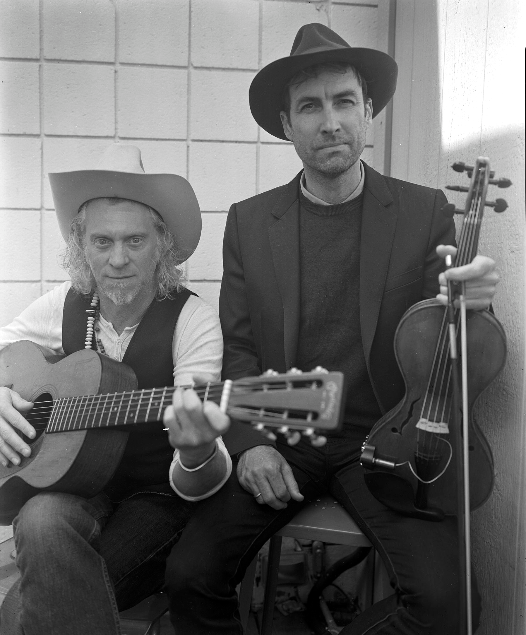 Jimbo Mathus and Andrew Bird with instruments 