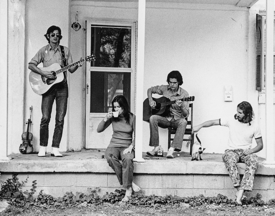 Townes Van Zandt, Susanna Clark, Guy Clark and Daniel Antopolsky on the porch at Guy and Susanna’s house in East Nashville, 1972. Courtesy Guy Clark