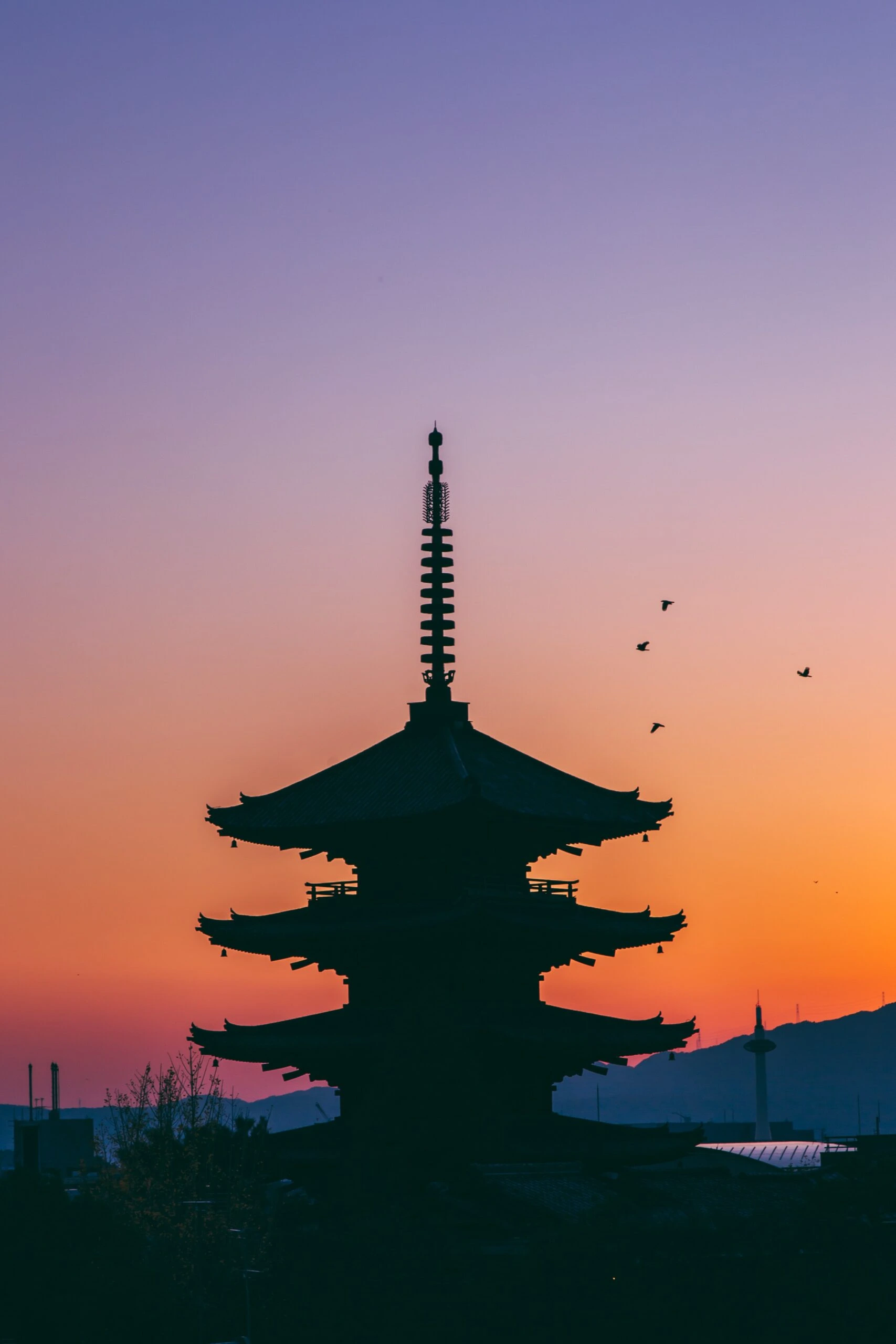 ash-edmonds-Tokyo Japanese Zen Temple spires evening-unsplash