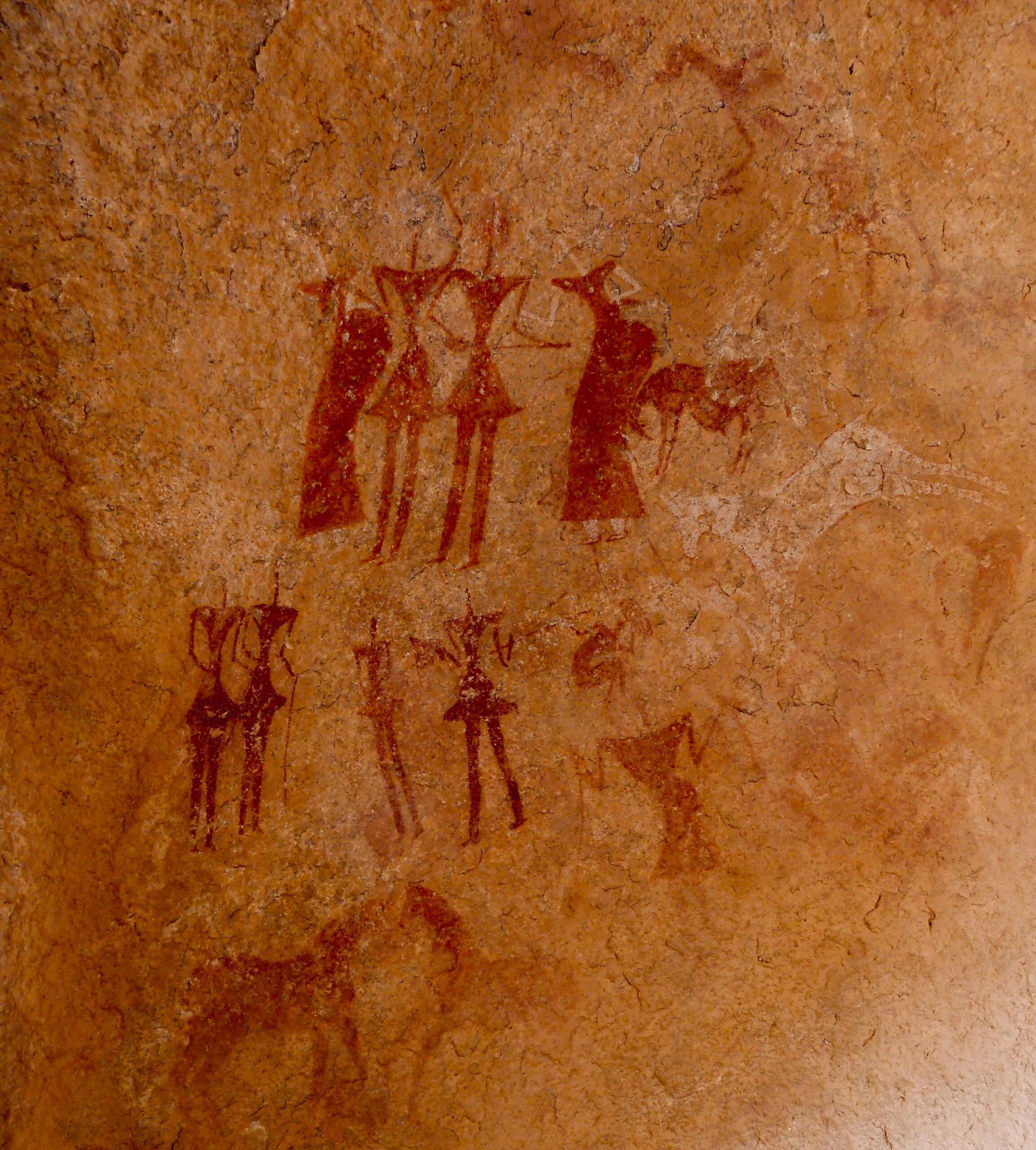 mini jupe in the algerian Sahara (Mertoutek, near Tamanrasset) , 6000 yaers old, prehistoric painting - photo made by rouichi / switzerland by azzedine rouichi unsplash