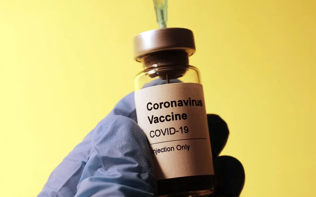 hakan-nural-Syringe drawing COVID19 vaccine dose-unsplash-scaled