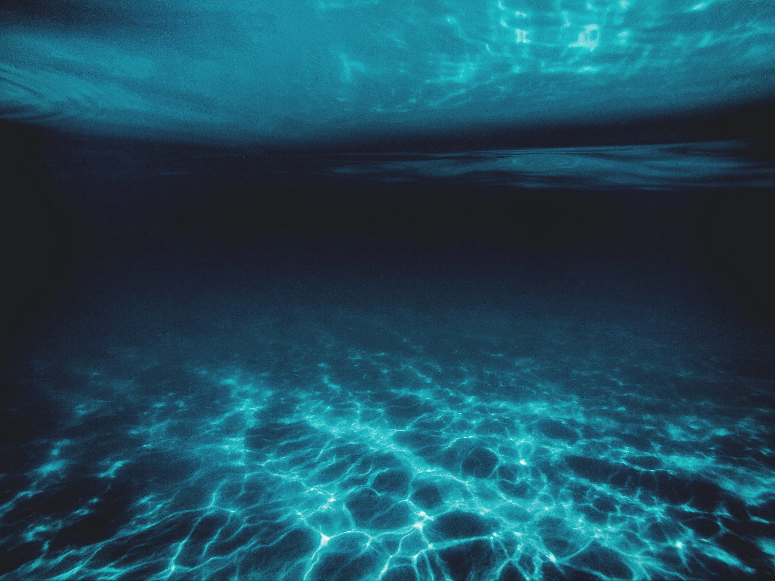 jonathan-borba-ocean from floor with filtered sunlight -unsplash-scaled