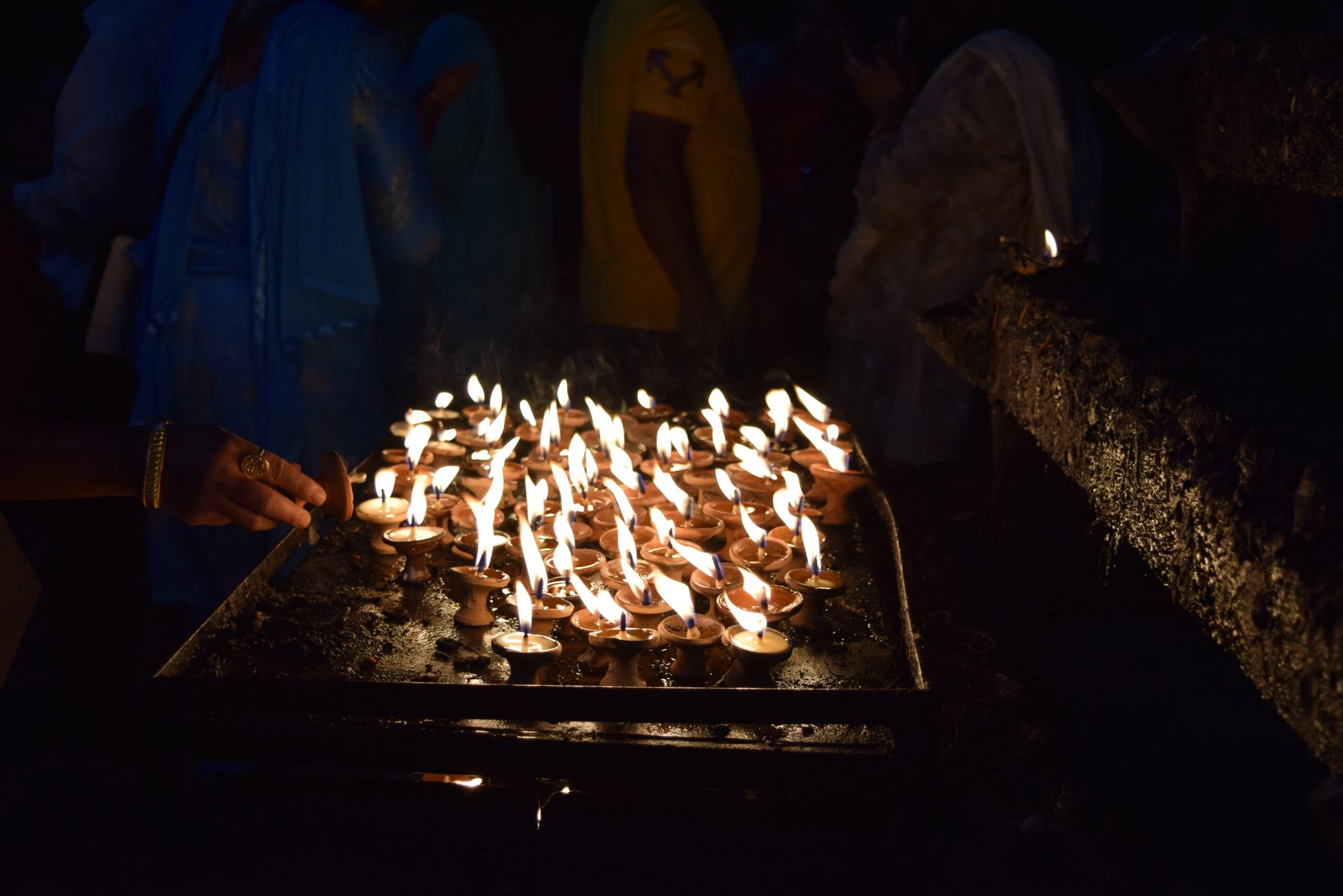 sumina-d-Votive candle lights at Hindu Temple-unsplash