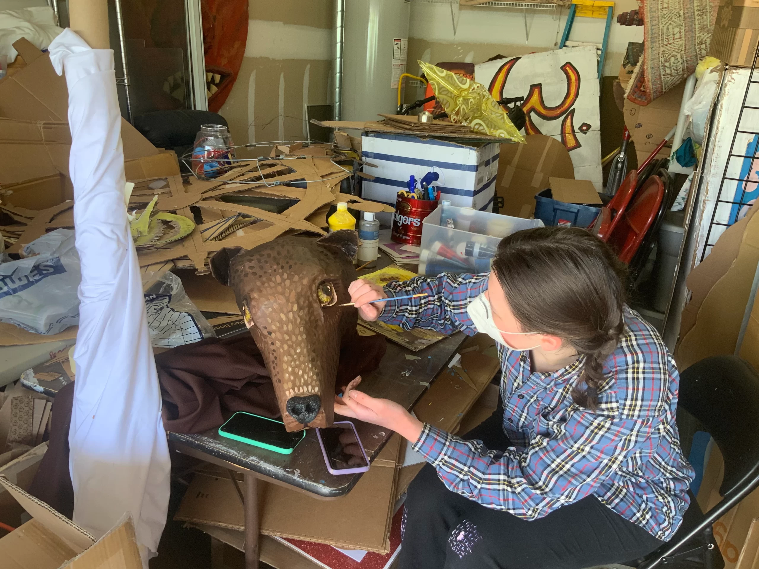 Sophia working on final touches on mask for The Time We have 1,2,3 Puppetry webp