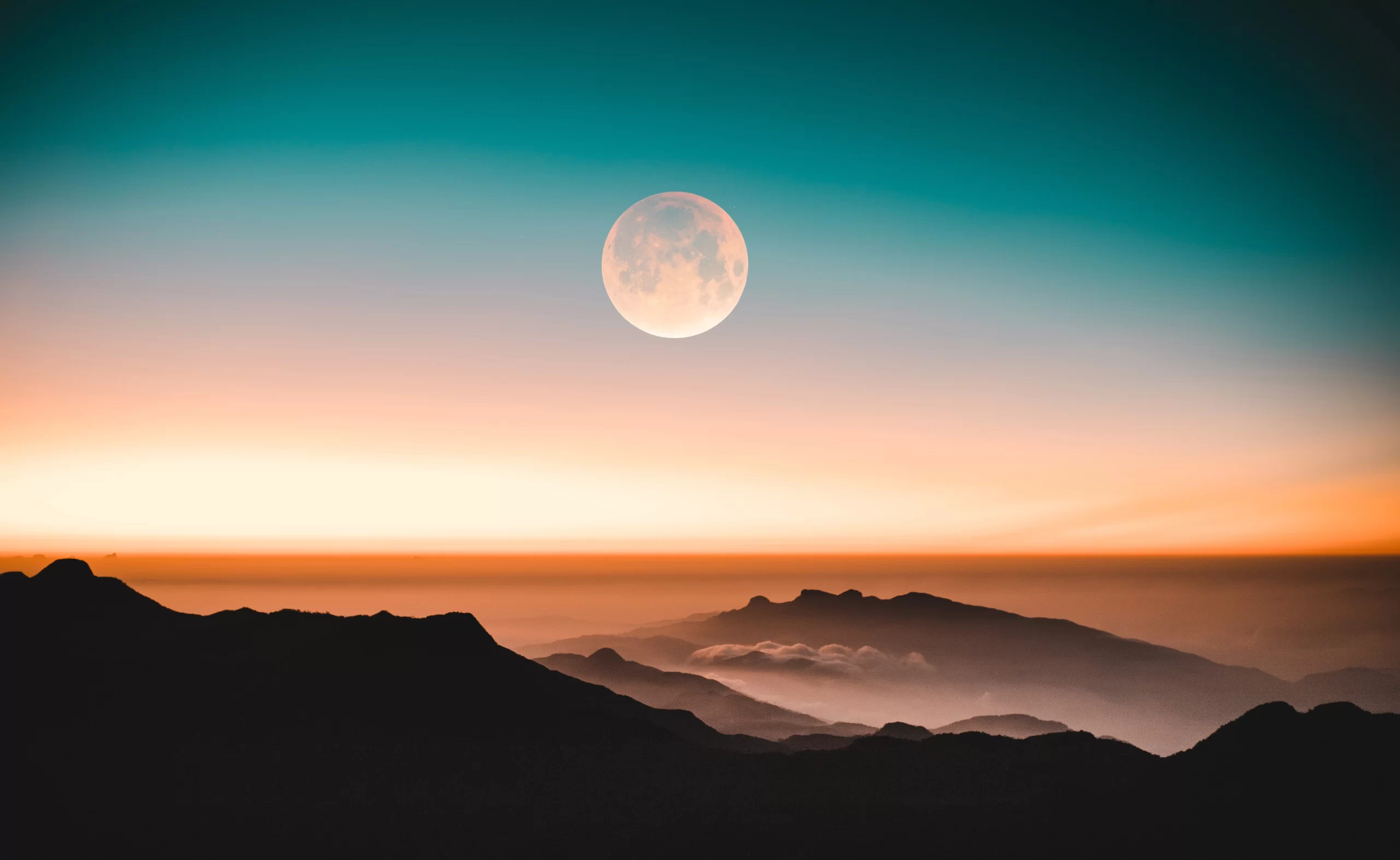 malith-d-karunarathne-Moon over desert scape evening-unsplash
