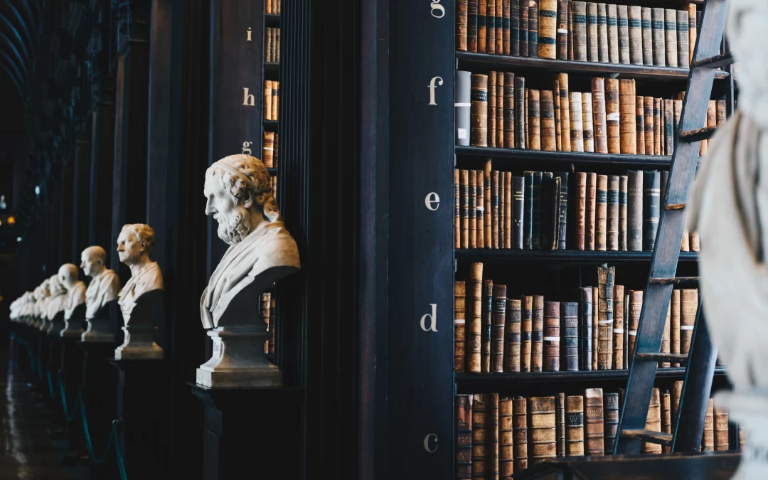 giammarco-Law Library shelves with busts of emeritus professors and legal scholarsunsplash