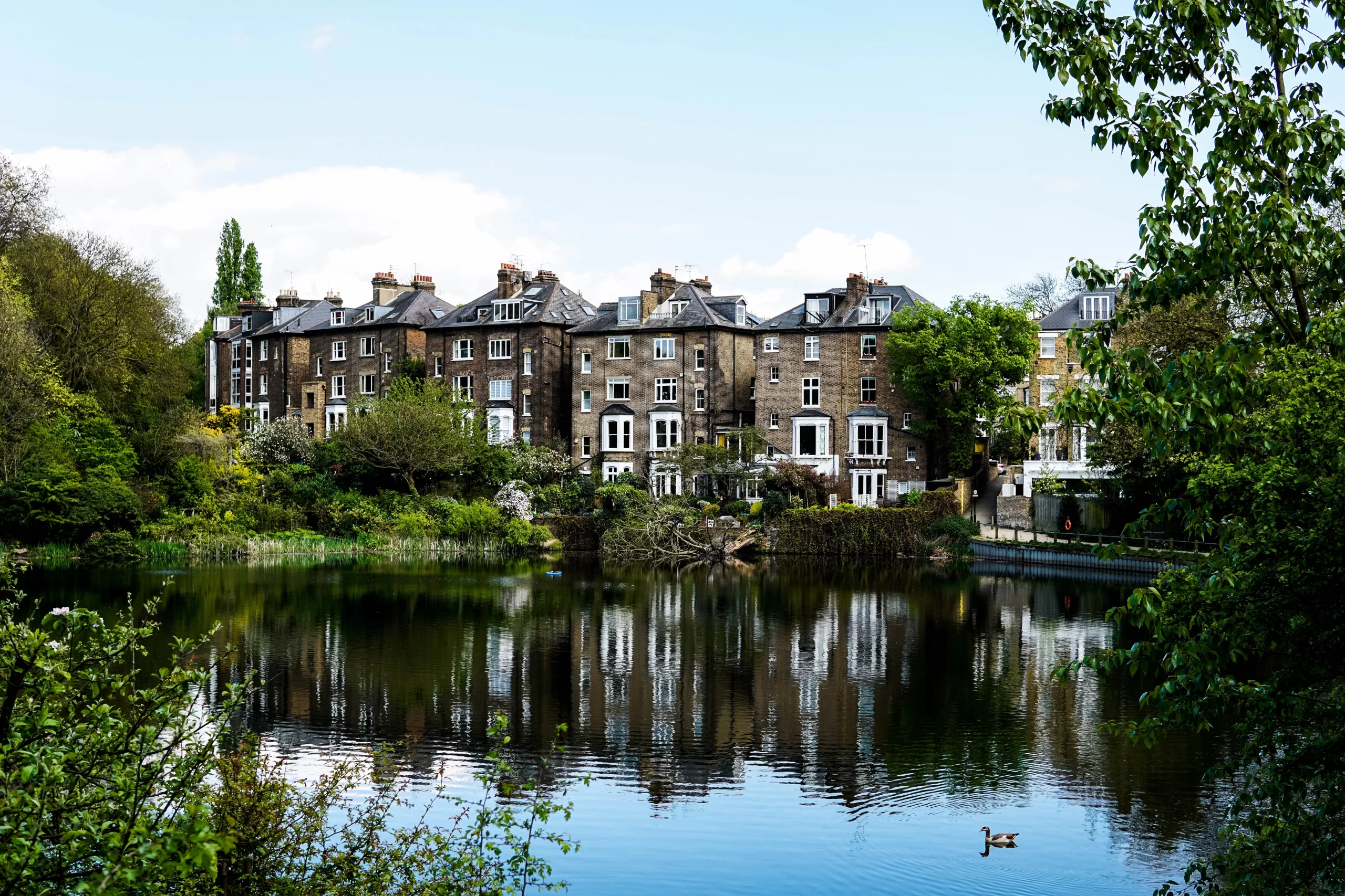 Hampstead Heath, London, United Kingdom Published on June 1, 2017 SONY, ILCE-6000 Free to use under the Unsplash License Walking along the river in Hampsted Heath public park found in London, a friend said it is her dream house, to have a view of the park and the river. I decided to capture that moment.