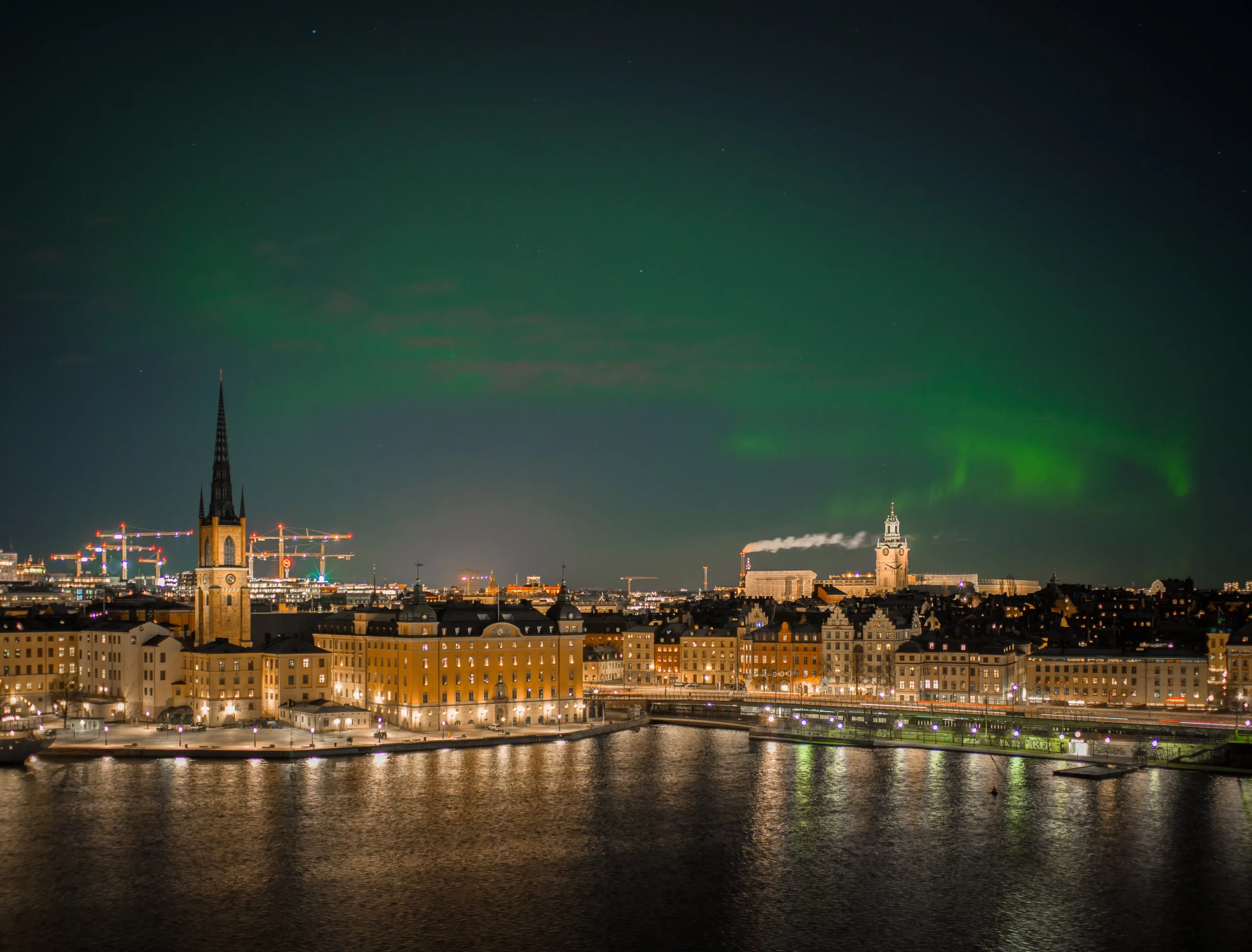 micael-widell-Northern-Lights-over-Stockholm-unsplash-scaled.webp
