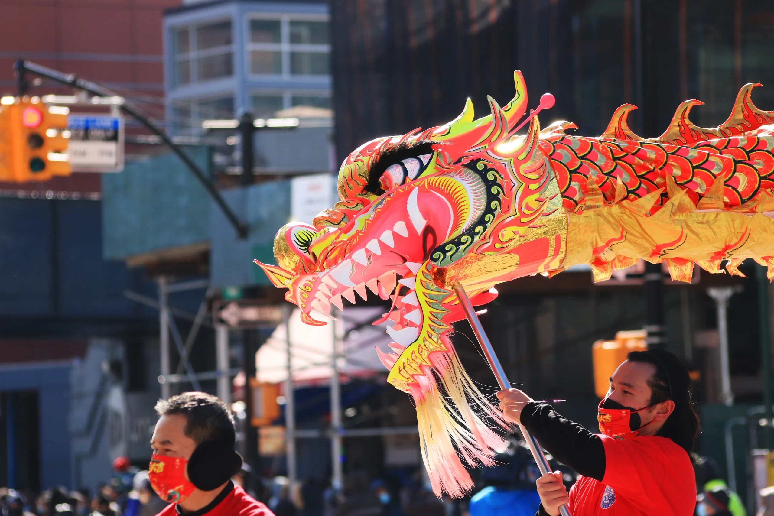 Flushing, Queens, NY, USA Published on February 5, 2022 Free to use under the Unsplash License Residents in Flushing, Queens NY celebrating Lunar New Year in a parade down on the Main Street on February 5, 2022. As Omicron variant surge fades, the community wishes for a better new year.