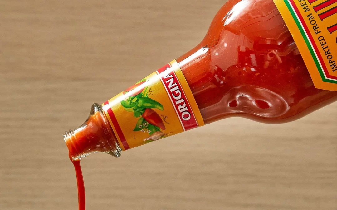 Cholula Hot Sauce pouring out